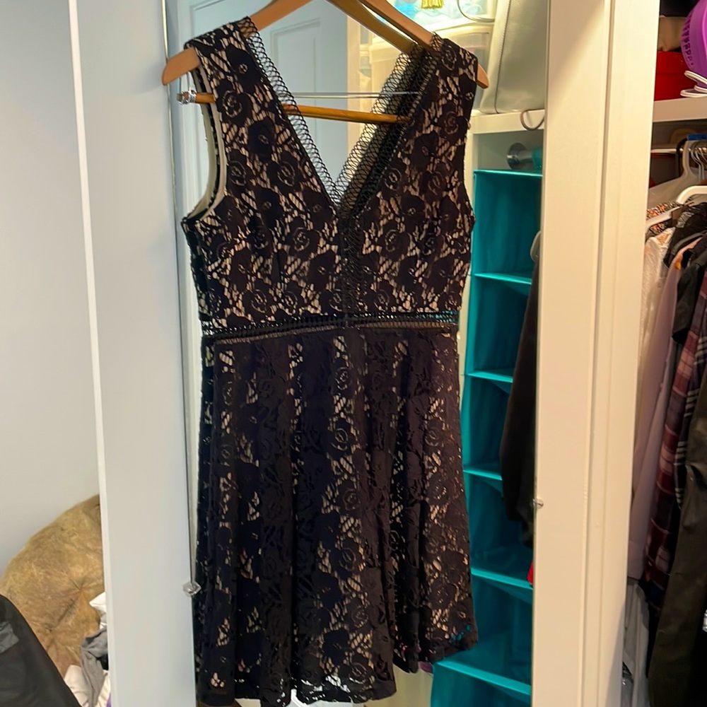 Francesca’s black lace dress